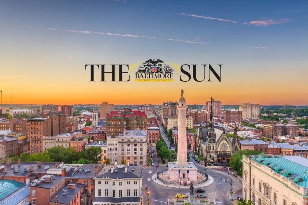 Baltimore City skyline with the Baltimore Sun logo.
